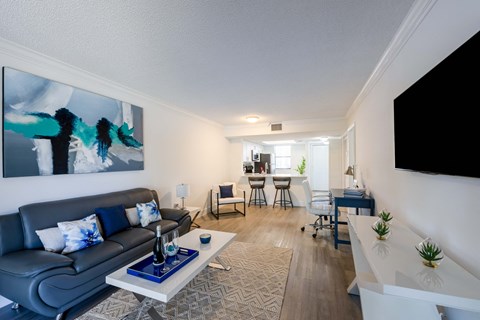 a living room with a couch and a table